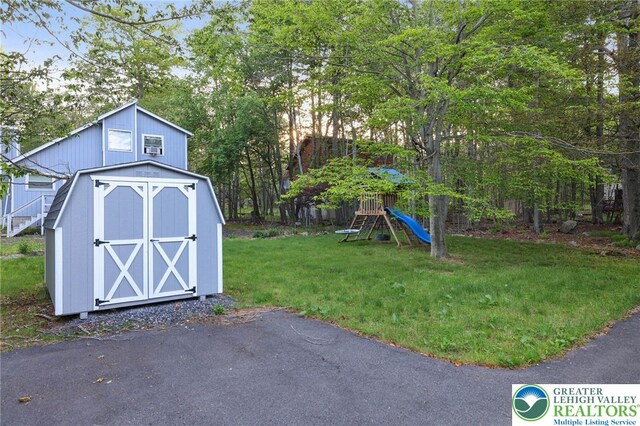 9436 Juniper Dr, Tobyhanna Twp, PA 18466 - view of shed featuring view of scattered trees