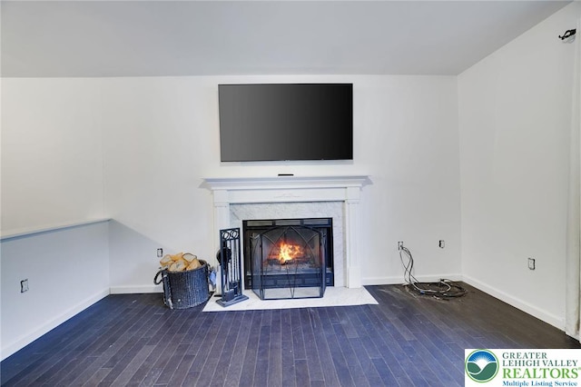 9436 Juniper Dr, Tobyhanna Twp, PA 18466 - unfurnished living room with hardwood / wood-style flooring and a high end fireplace