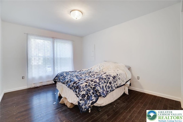 9436 Juniper Dr, Tobyhanna Twp, PA 18466 - bedroom featuring hardwood / wood-style flooring and baseboards