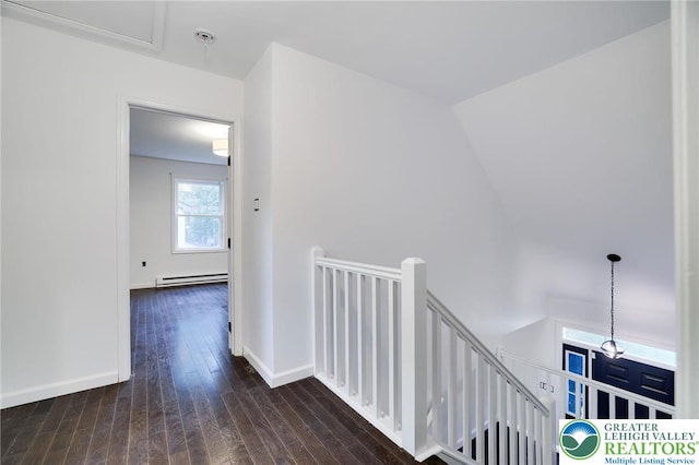 9436 Juniper Dr, Tobyhanna Twp, PA 18466 - corridor featuring an upstairs landing, baseboard heating, and hardwood / wood-style flooring