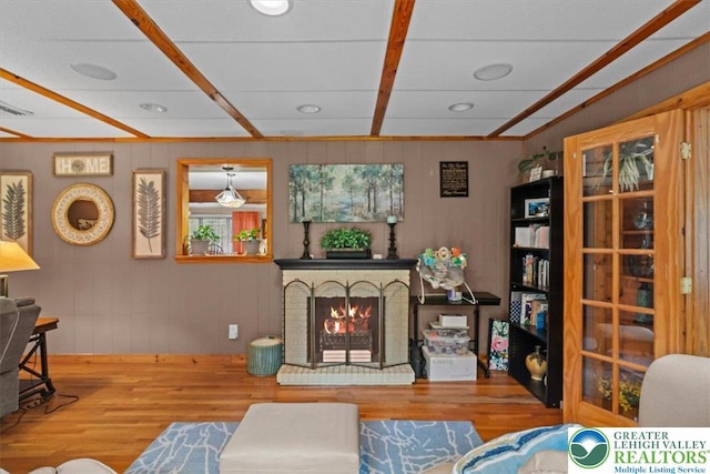 3315 Aspen Rd, Polk Twp, PA 18058 - living area with wood finished floors, a brick fireplace, and recessed lighting