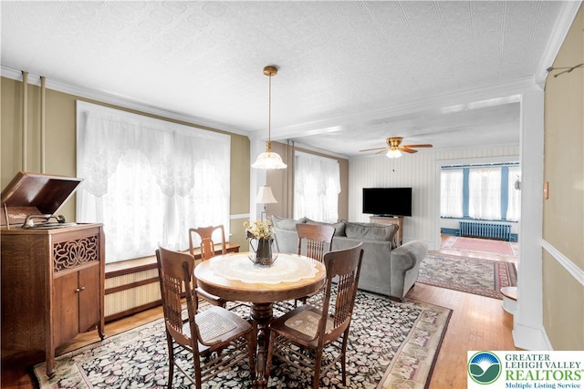 600 S Hoffert St, Fountain Hill Boro, PA 18015 - dining space featuring radiator, light wood-style floors, ceiling fan, and ornamental molding