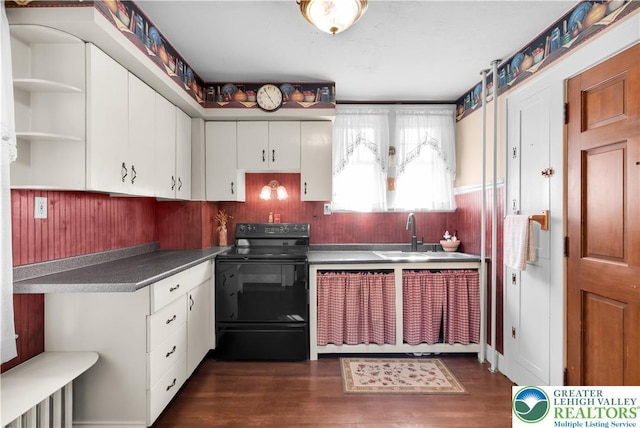 600 S Hoffert St, Fountain Hill Boro, PA 18015 - kitchen featuring electric range, white cabinets, dark wood-style flooring, wood walls, and open shelves