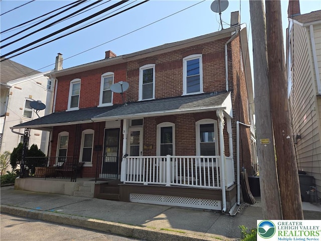 31 N 4th St, Emmaus Boro, PA 18049 - view of property with a porch and brick siding
