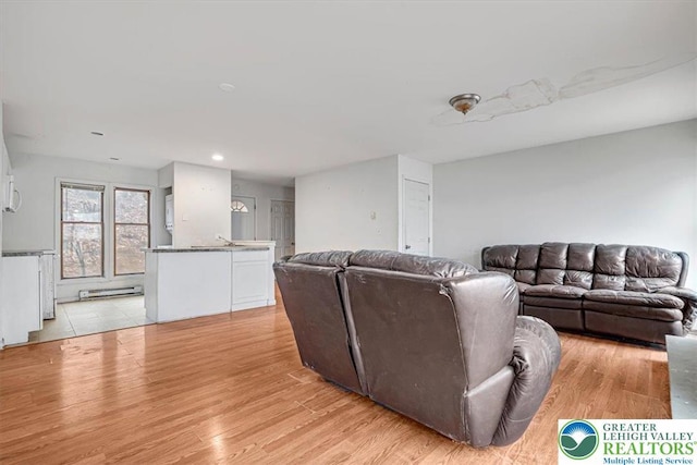 417 Hickory Dr, Jackson Twp, PA 18372 - living room with light wood-style floors and recessed lighting