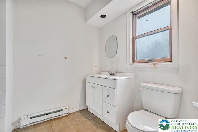 417 Hickory Dr, Jackson Twp, PA 18372 - bathroom featuring a baseboard radiator, vanity, and tile patterned floors