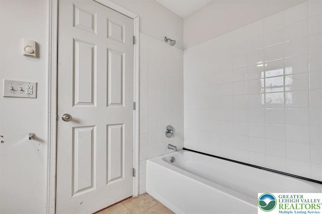 417 Hickory Dr, Jackson Twp, PA 18372 - bathroom featuring tile patterned floors and shower / washtub combination