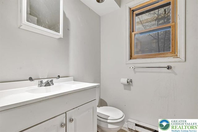 417 Hickory Dr, Jackson Twp, PA 18372 - half bath with a baseboard heating unit and vanity