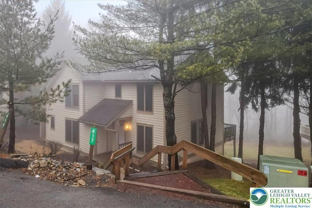 417 Hickory Dr, Jackson Twp, PA 18372 - view of front facade featuring a shingled roof