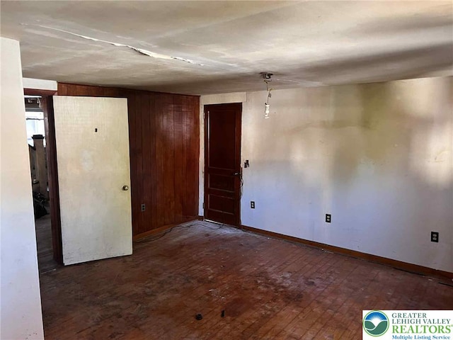 22 Fetherman, Stroudsburg, PA 18360 - empty room featuring hardwood / wood-style flooring and wood walls
