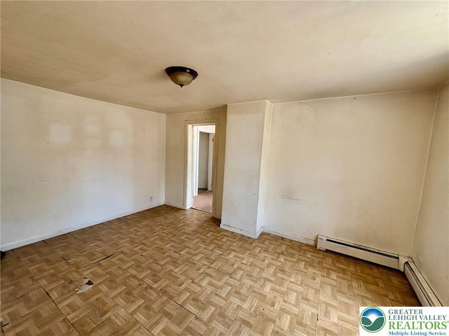 342 Race St, Catasauqua Borough, PA 18032 - spare room with baseboards and a baseboard radiator