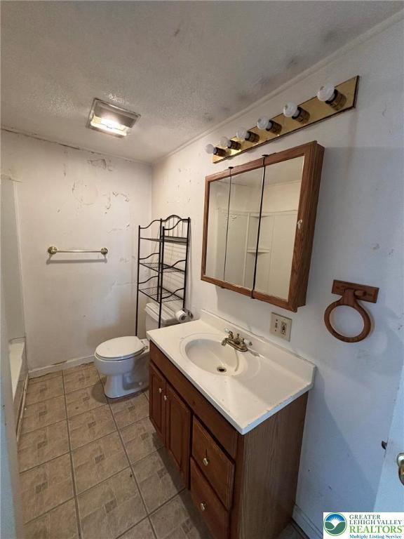 342 Race St, Catasauqua Borough, PA 18032 - bathroom with vanity, a textured ceiling, tile patterned flooring, a bathtub, and a shower