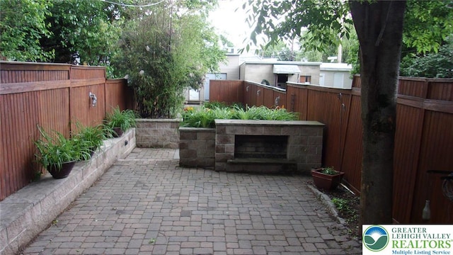 139 N 11th St, Allentown City, PA 18102 - fenced backyard with a patio area