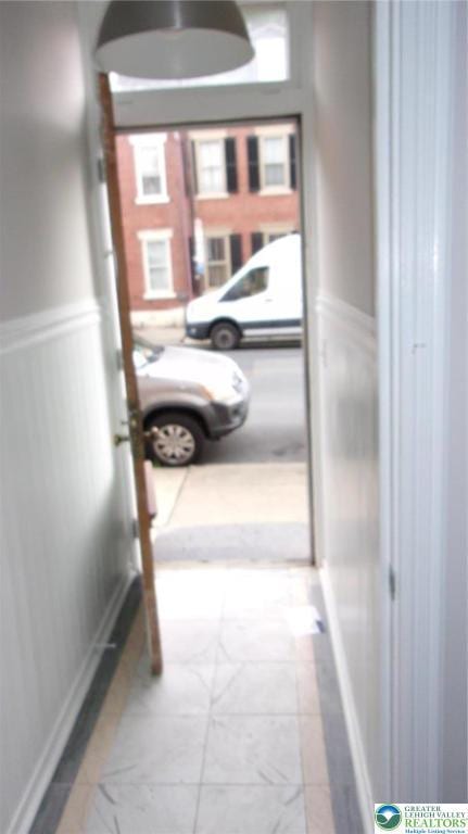 139 N 11th St, Allentown City, PA 18102 - hallway featuring a wainscoted wall