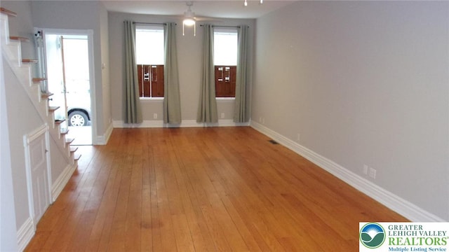 139 N 11th St, Allentown City, PA 18102 - foyer entrance featuring light wood-type flooring and stairs