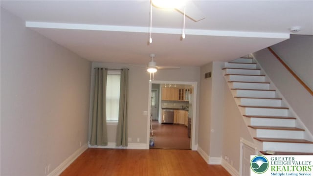 139 N 11th St, Allentown City, PA 18102 - stairway featuring wood finished floors and ceiling fan