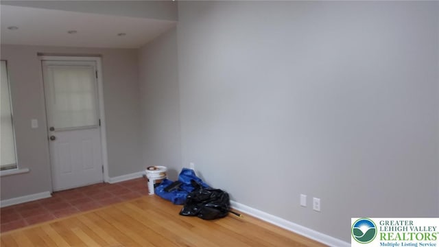 139 N 11th St, Allentown City, PA 18102 - foyer with wood finished floors and baseboards