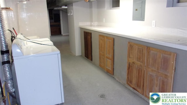 139 N 11th St, Allentown City, PA 18102 - washroom featuring washer / clothes dryer, electric panel, and cabinet space