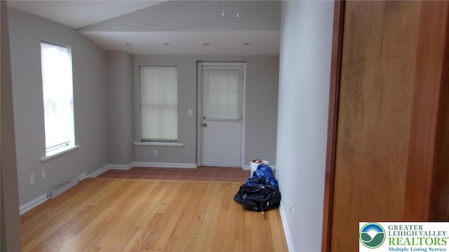 139 N 11th St, Allentown City, PA 18102 - foyer entrance featuring wood finished floors, plenty of natural light, and vaulted ceiling