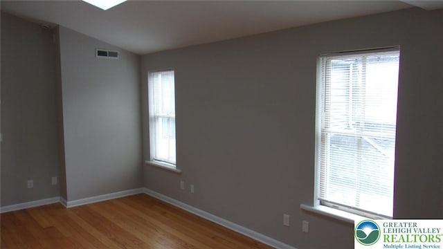 139 N 11th St, Allentown City, PA 18102 - empty room featuring light wood finished floors and lofted ceiling