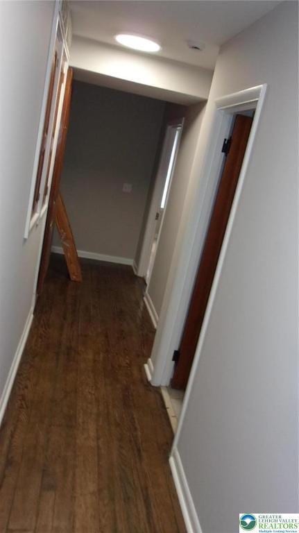 139 N 11th St, Allentown City, PA 18102 - hall featuring wood finished floors and baseboards