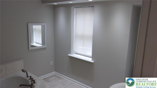 139 N 11th St, Allentown City, PA 18102 - bathroom with tile patterned floors, recessed lighting, and a tub