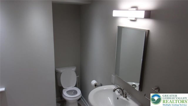 139 N 11th St, Allentown City, PA 18102 - bathroom featuring a sink and toilet