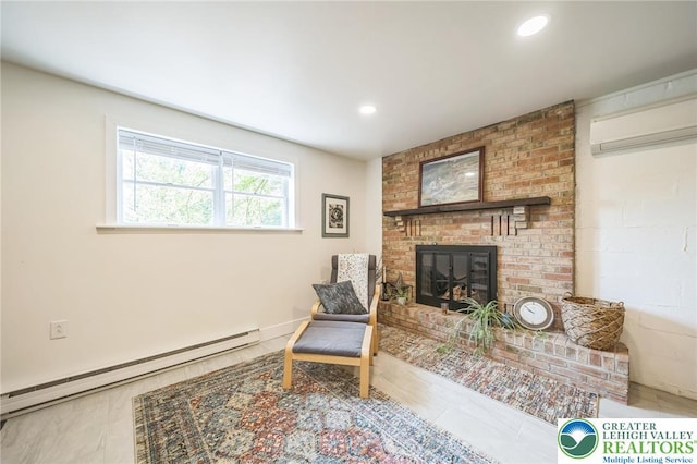 2922 Dogwood Dr, Coopersburg Boro, PA 18036 - living area featuring a baseboard radiator, a brick fireplace, a wall unit AC, and recessed lighting