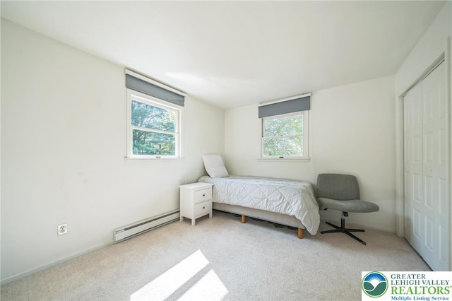 2922 Dogwood Dr, Coopersburg Boro, PA 18036 - bedroom featuring baseboard heating, multiple windows, light carpet, and a closet