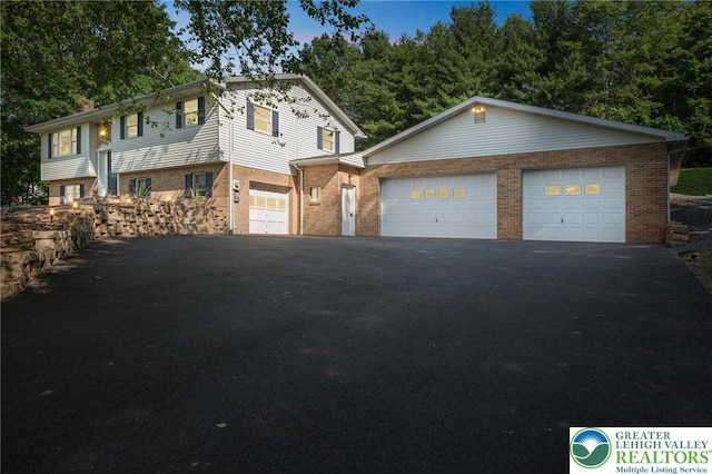 2922 Dogwood Dr, Coopersburg Boro, PA 18036 - view of front of property with a garage and brick siding
