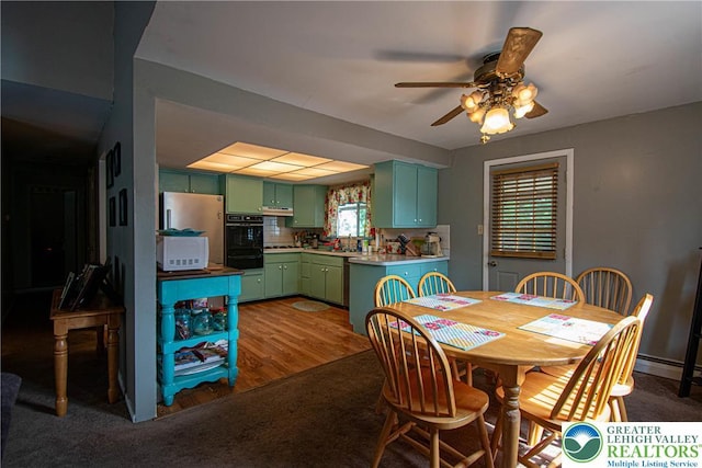 1208 E Susquehanna St, Salisbury Twp, PA 18103 - dining room with a ceiling fan and wood finished floors