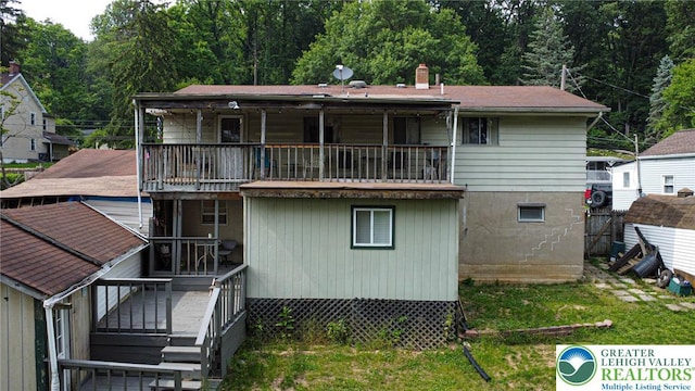 1208 E Susquehanna St, Salisbury Twp, PA 18103 - back of property featuring a balcony and a chimney