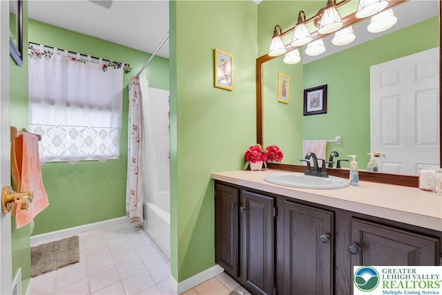 3780 Barlow Pl, Bethlehem Twp, PA 18020 - bathroom featuring vanity, shower / bath combo with shower curtain, and tile patterned flooring