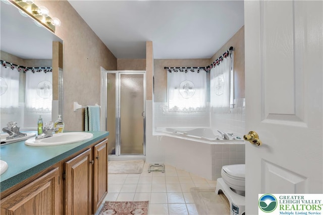 3780 Barlow Pl, Bethlehem Twp, PA 18020 - full bathroom with a stall shower, a garden tub, tile patterned floors, and double vanity
