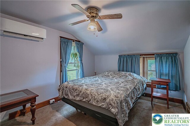 636 School Rd, Plainfield Twp, PA 18064 - carpeted bedroom featuring a wall unit AC, lofted ceiling, multiple windows, and ceiling fan