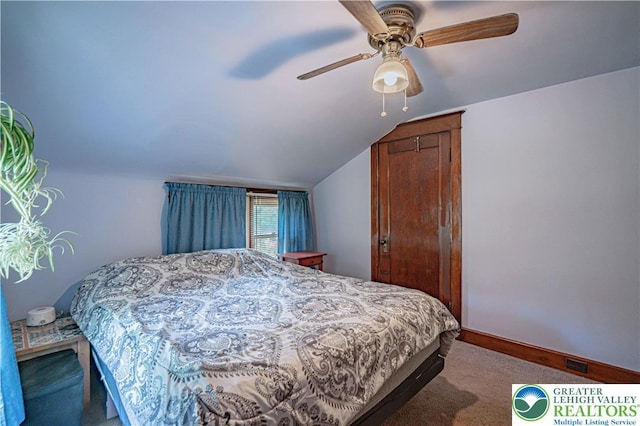 636 School Rd, Plainfield Twp, PA 18064 - bedroom with vaulted ceiling, carpet floors, and ceiling fan