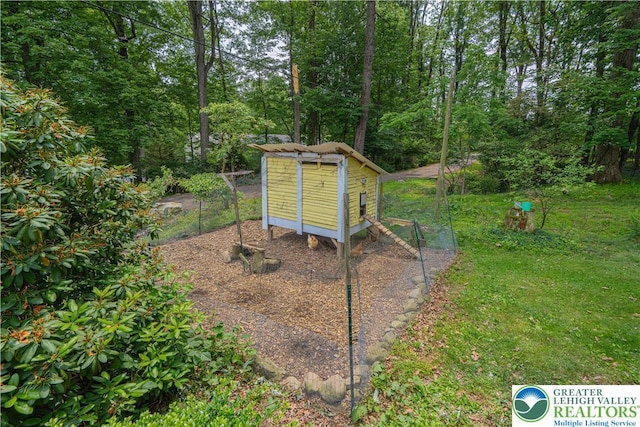 636 School Rd, Plainfield Twp, PA 18064 - view of yard with exterior structure and an outbuilding