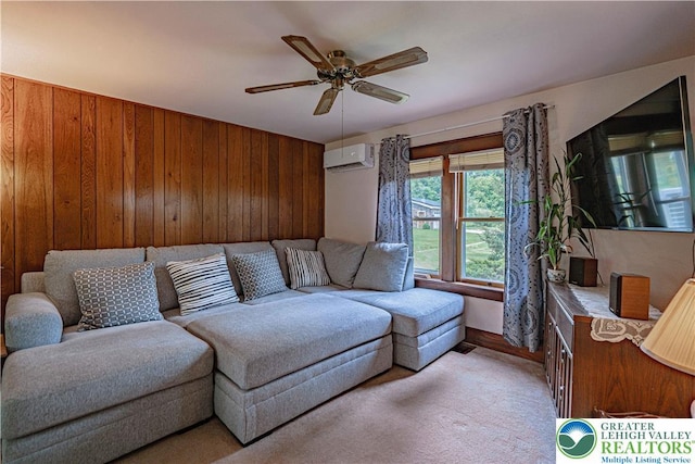 636 School Rd, Plainfield Twp, PA 18064 - living room featuring a wall unit AC, wooden walls, and ceiling fan