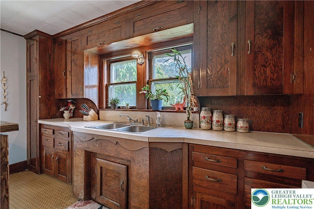 636 School Rd, Plainfield Twp, PA 18064 - kitchen featuring light countertops and light carpet