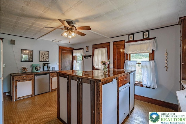 636 School Rd, Plainfield Twp, PA 18064 - kitchen featuring a ceiling fan, dark countertops, fridge, and a center island
