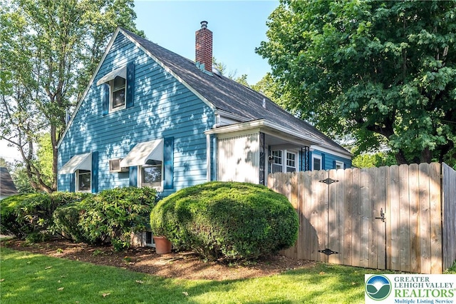321 Willow Rd, Hellertown Borough, PA 18055 - view of side of home featuring a chimney