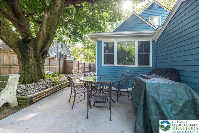 321 Willow Rd, Hellertown Borough, PA 18055 - fenced backyard featuring outdoor dining space and a patio area