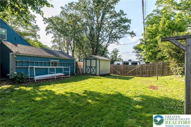 321 Willow Rd, Hellertown Borough, PA 18055 - fenced backyard with a storage unit