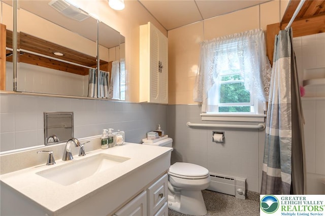 1571 Penn Dr, West Penn Twp, PA 18211 - full bath featuring baseboard heating, tile walls, vanity, and a shower with curtain