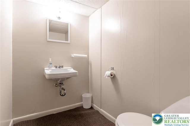 1571 Penn Dr, West Penn Twp, PA 18211 - bathroom featuring toilet and baseboards