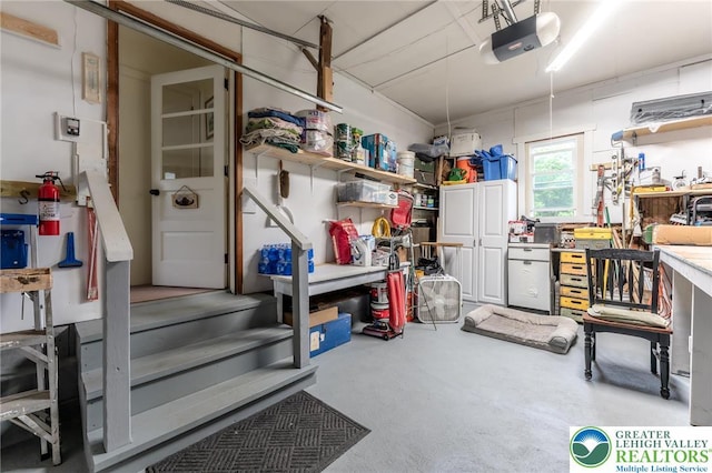 1571 Penn Dr, West Penn Twp, PA 18211 - garage with a garage door opener and a workshop area