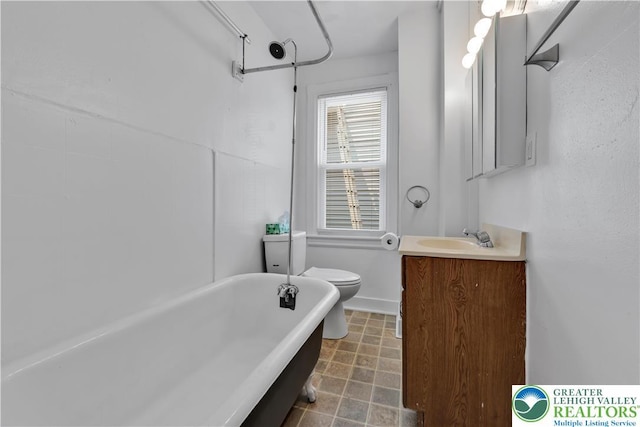 834 Bushkill St, Easton, PA 18042 - bathroom with a soaking tub and vanity