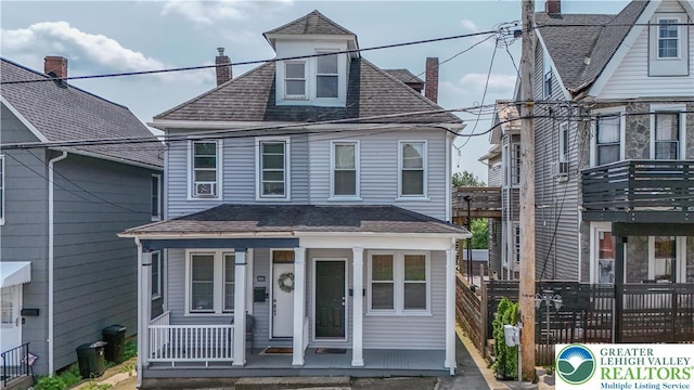834 Bushkill St, Easton, PA 18042 - view of front of home featuring a porch, roof with shingles, and a chimney