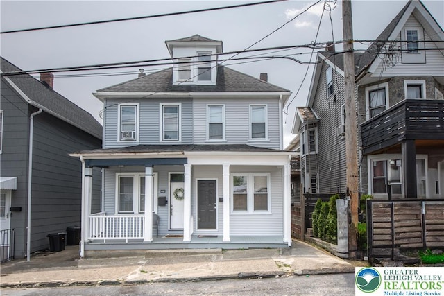 834 Bushkill St, Easton, PA 18042 - american foursquare style home with a porch and roof with shingles