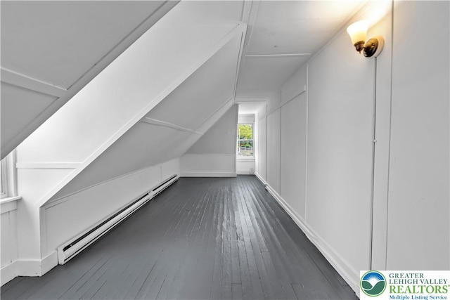 834 Bushkill St, Easton, PA 18042 - additional living space with a baseboard radiator, dark wood-type flooring, and vaulted ceiling
